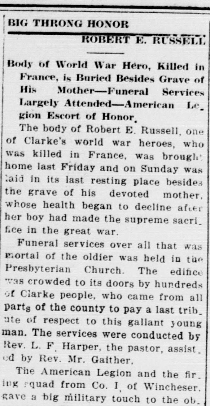 A cropped piece of a page of the Clarke Courier of September 15, 1921, showing a newspaper column headed BIG THRONG HONOR ROBERT E. RUSSELL, with a deck about the burial of a world war hero beside his mother's grave, followed by the first paragraphs of the report.