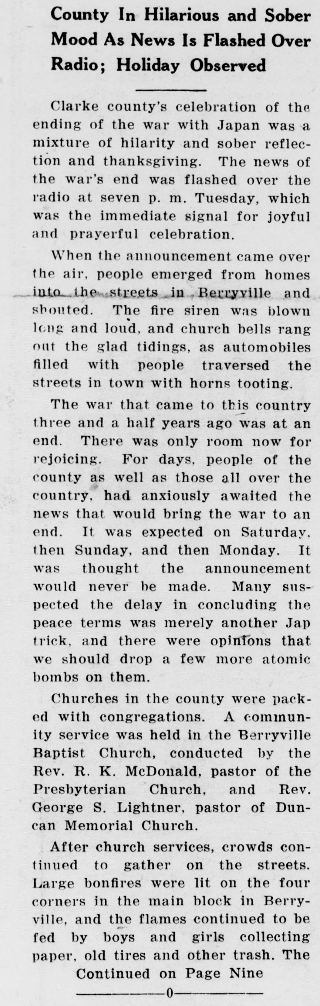 One column of a front-page report under the subhead "County In Hilarious and Sober Mood As News Is Flashed Over Radio; Holiday Observed." It describes the news arriving by radio, people shouting in the streets, the community service at the Berryville Baptist Church and bonfires fed by boys and girls, ending with a note that it continues on page nine.