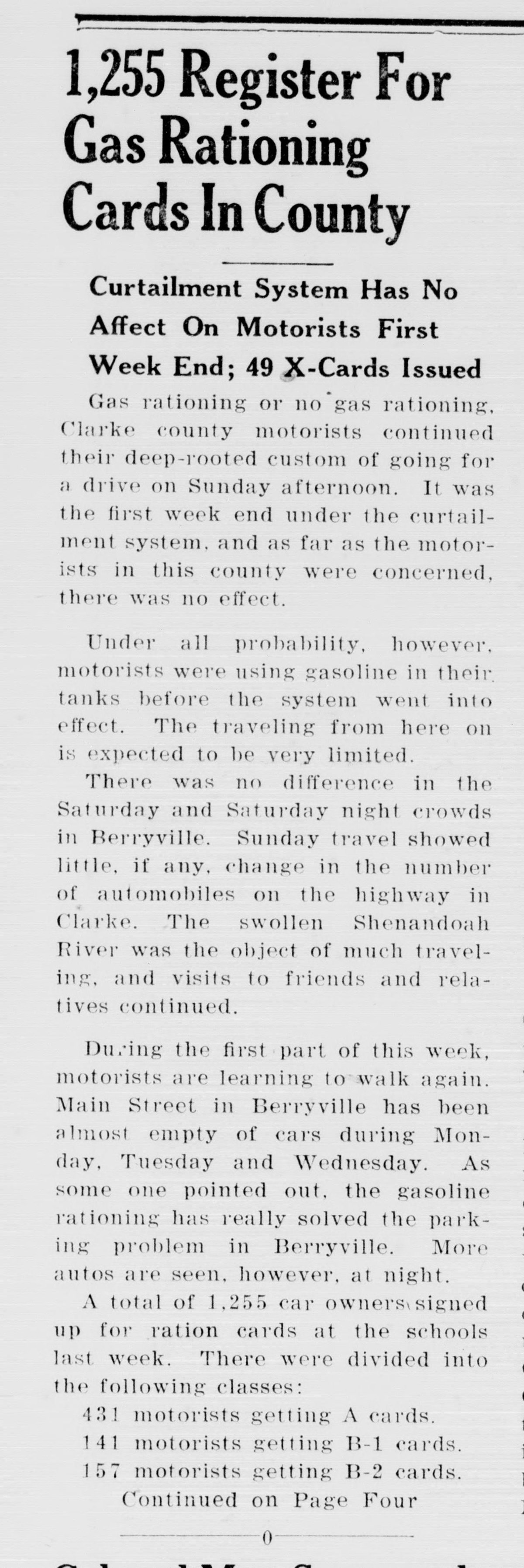 A front-page newspaper column headed "1,255 Register For Gas Rationing Cards In County," with a subhead ending "49 X-Cards Issued." It describes the first weekend of rationing, the swollen Shenandoah River and Main Street almost empty of cars, then lists 431 A cards, 141 B-1 and 157 B-2 cards before the line "Continued on Page Four," which sends the reader to the rest of the report.