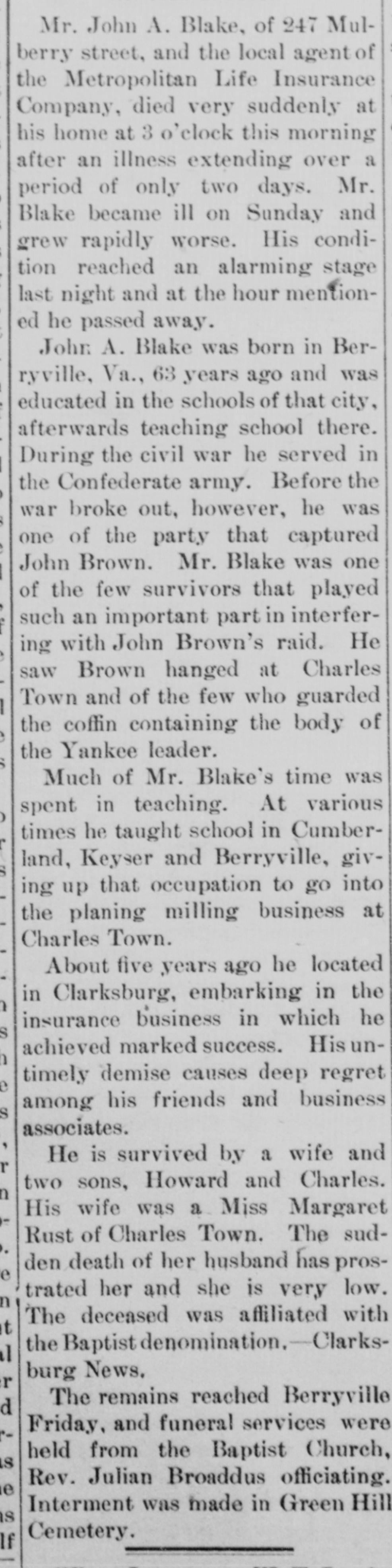 A long narrow newspaper column: the death notice of John A. Blake, born in Berryville, a teacher and later an insurance man at Clarksburg, saying he served in the Confederate army, was one of the party that captured John Brown and saw him hanged at Charles Town, and was buried at Green Hill Cemetery.