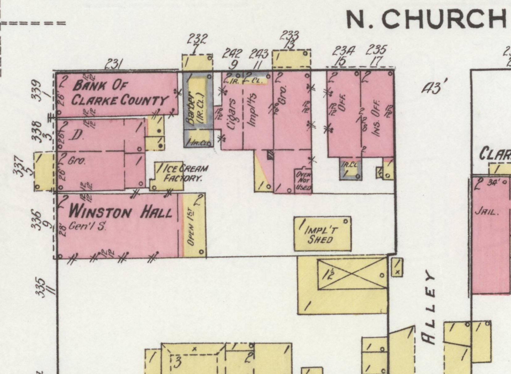 A detail of a hand-colored fire insurance map. A row of buildings tinted pink, the Sanborn color for brick, is lettered BANK OF CLARKE COUNTY at the top, then D. and Gro., and below them the largest, WINSTON HALL, with Gen'l S. beneath the name and a narrow strip marked OPEN 1ST along its right side. Pairs of numbers down the left edge begin 339, 338, 337, 336 and 335. Across the top are more pink buildings marked Barber, Cigars, Impl'ts, Gro., Off. and Ins. Off., with a small yellow ICE CREAM FACTORY and an IMPL'T SHED behind them. The street name N. CHURCH is printed at top right, and a lane lettered ALLEY runs down the right side past part of a brick building marked JAIL.